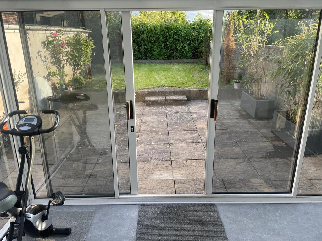 A bright and inviting garden space viewed throu...