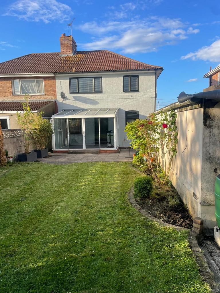 A well-maintained and spacious garden area feat...