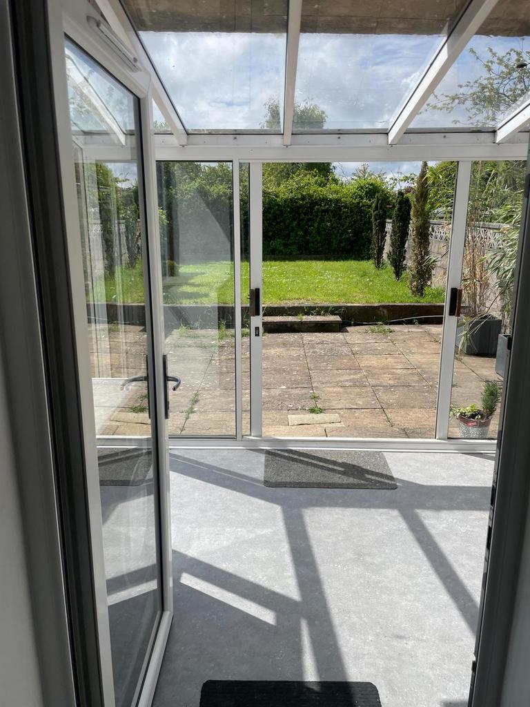 Bright and inviting garden space with a spaciou...
