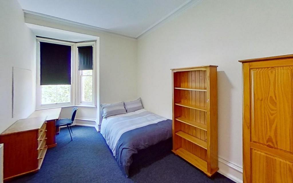 Bright and inviting double bedroom featuring a ...