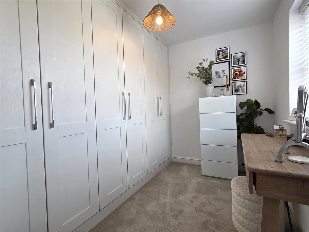 Bedroom three/dressing room