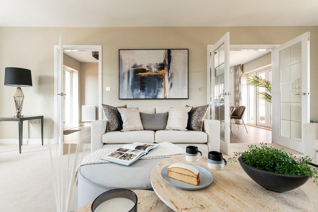 The dual aspect design floods the living room...