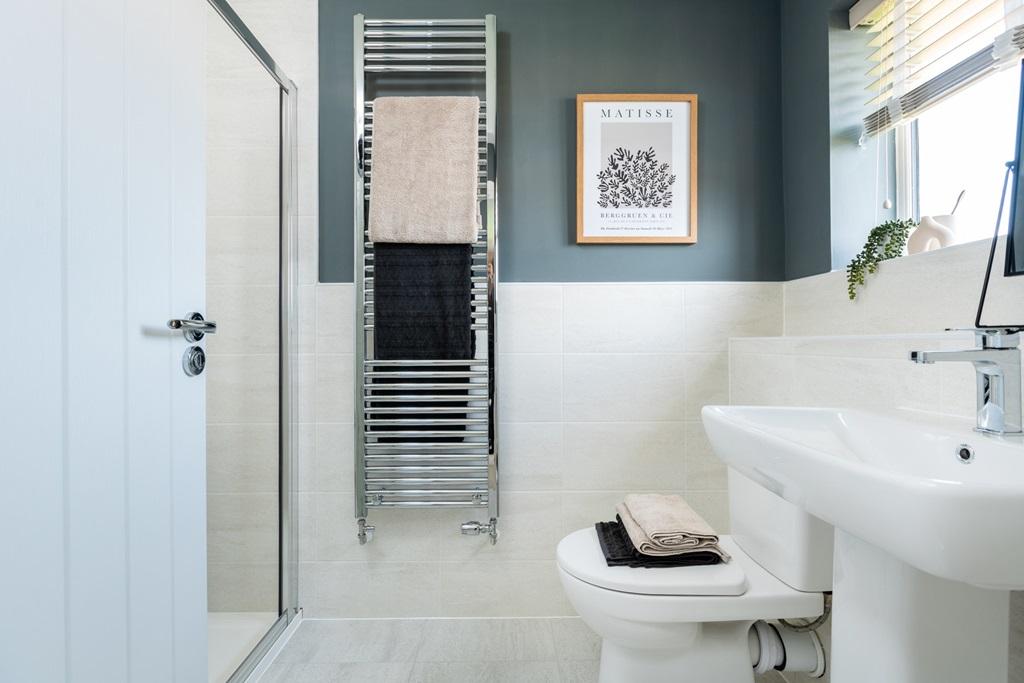 The main bedroom benefits from an en suite...