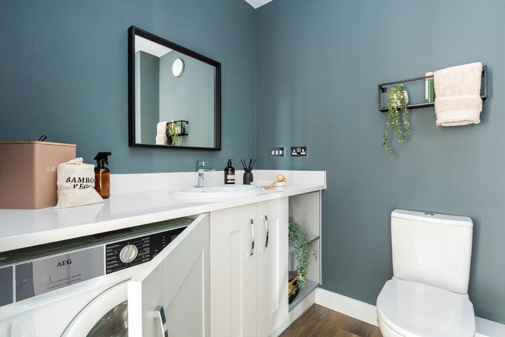 Handy cloakroom and utility room with laundry...