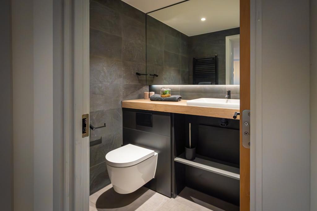 A modern and clean bathroom featuring stylish f...