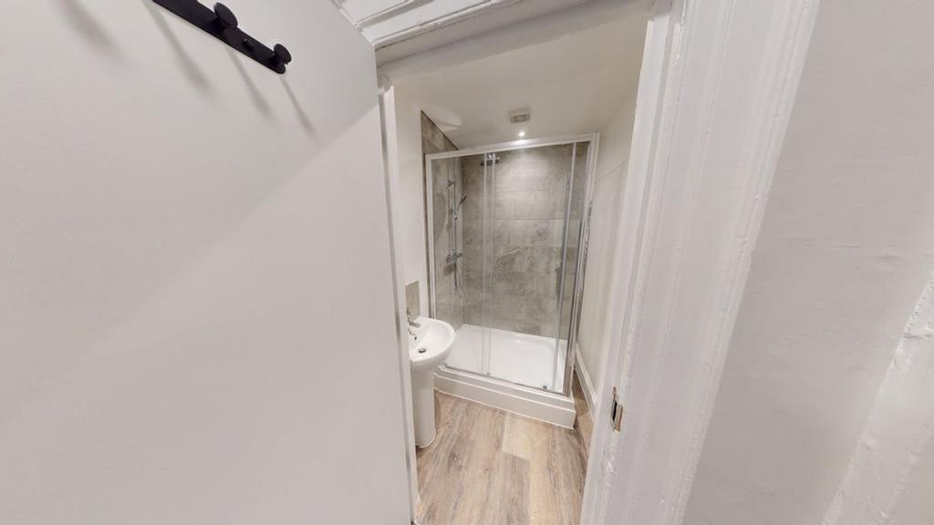A modern and clean bathroom featuring a sleek s...