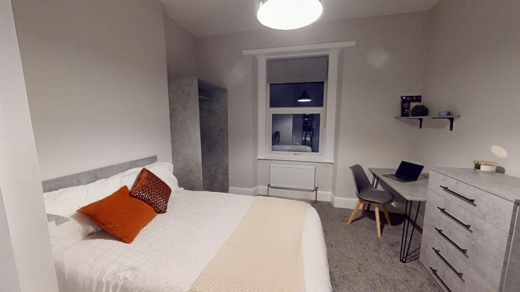 A stylish and inviting double bedroom, perfect ...