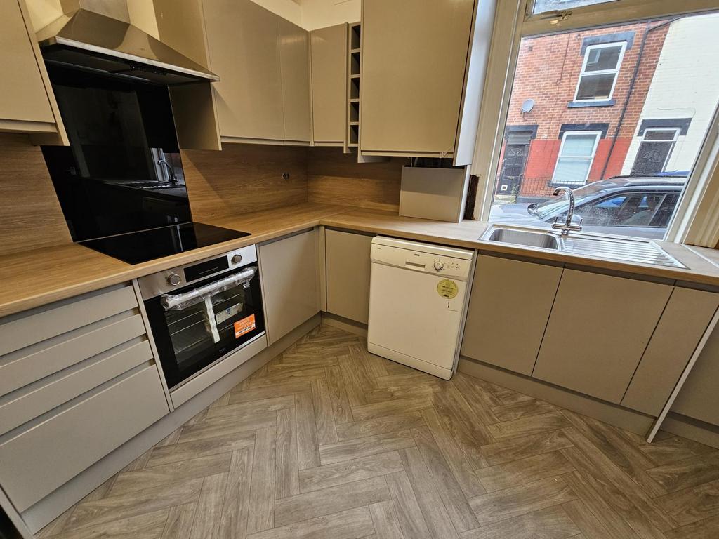 Bright and modern kitchen with ample countertop...
