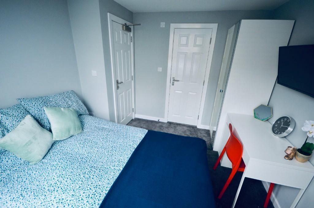 A stylish and inviting double bedroom perfect f...