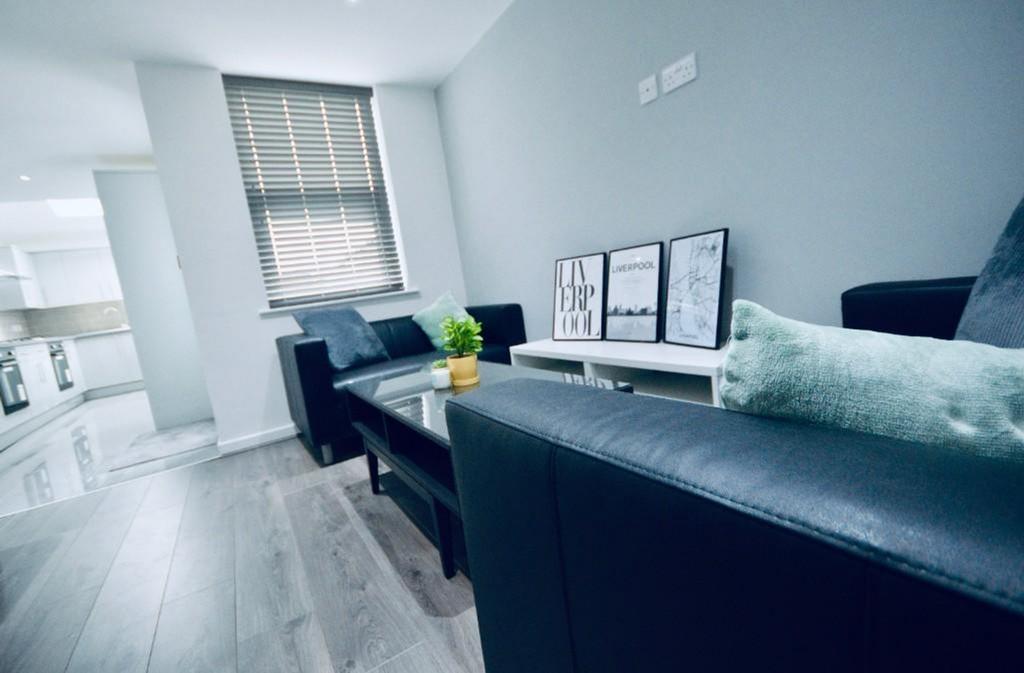 A stylish and inviting living room with modern ...