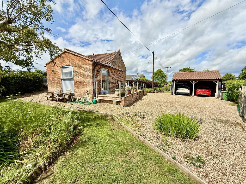 Rear aspect and driveway