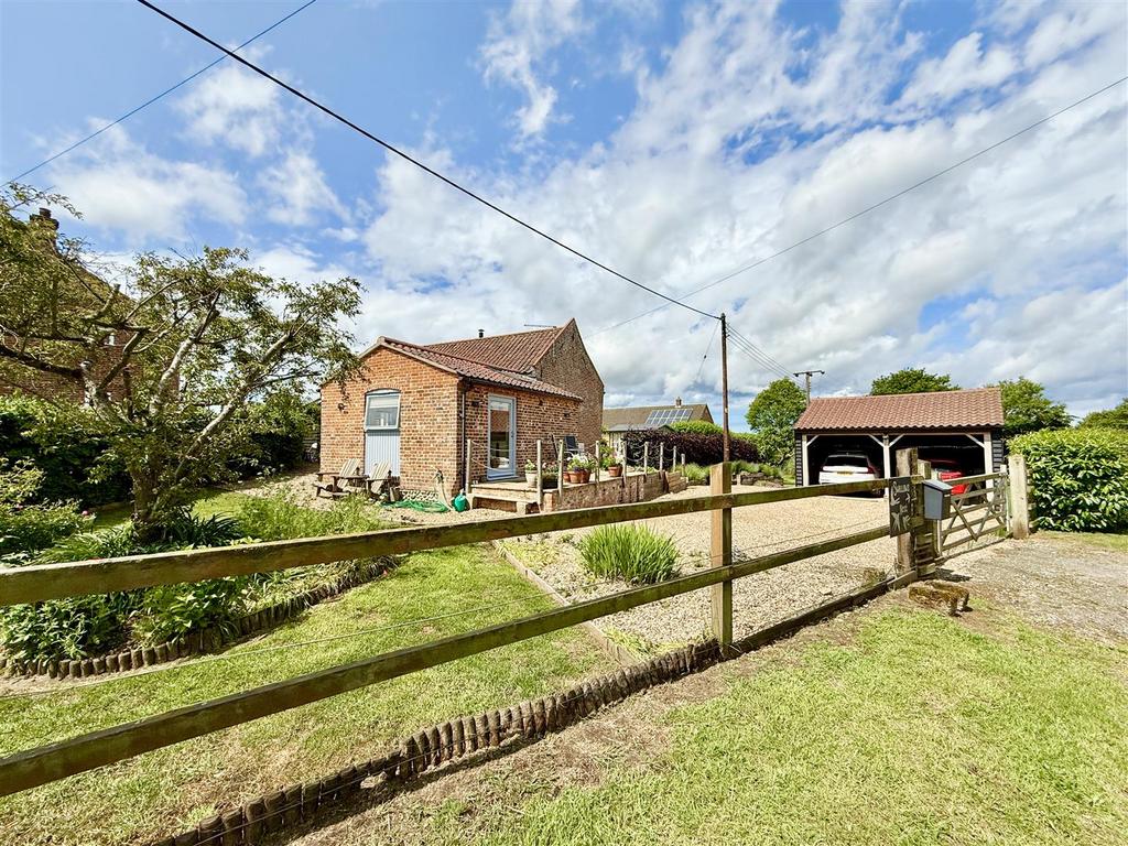 Rear aspect and driveway
