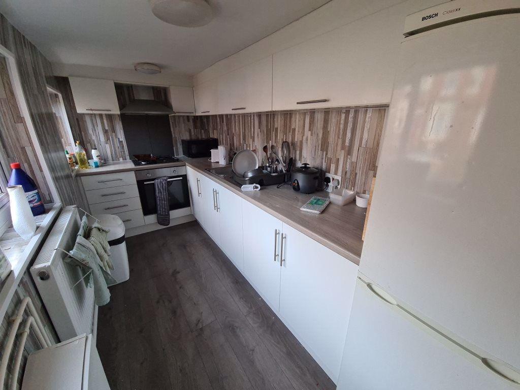 Modern kitchen with ample counter space, sleek ...