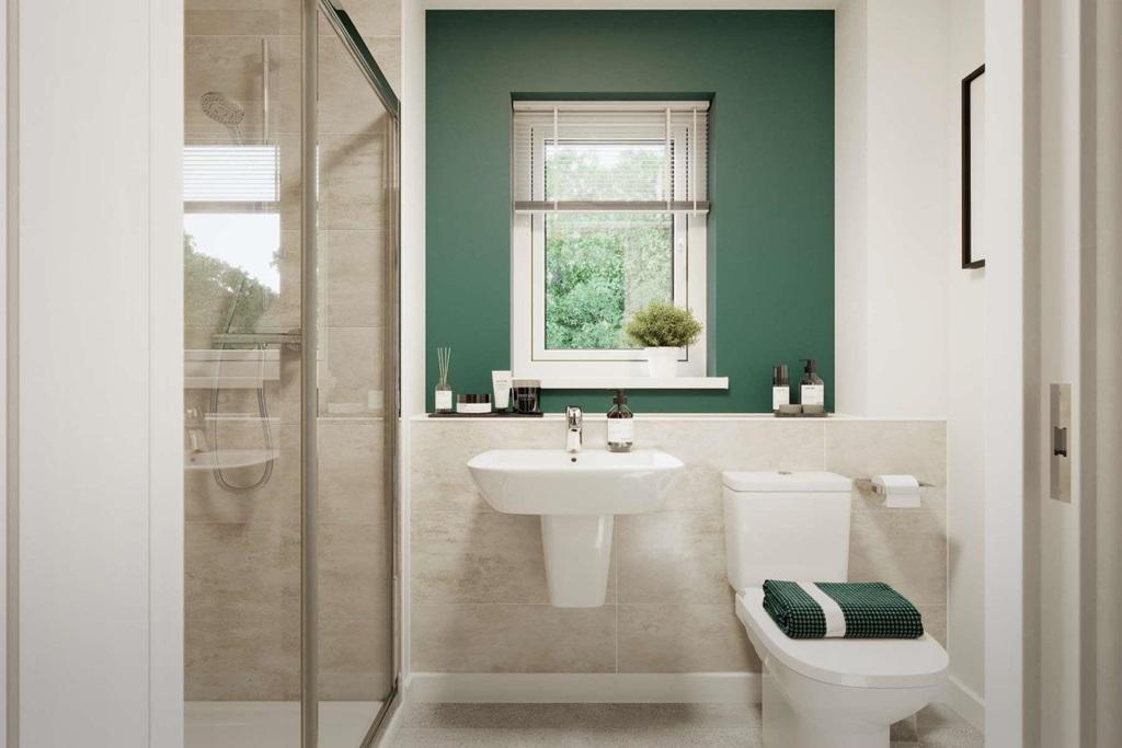 The main bedroom has it's own en-suite shower room