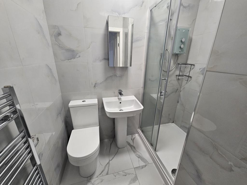 A modern, well-maintained bathroom featuring a ...