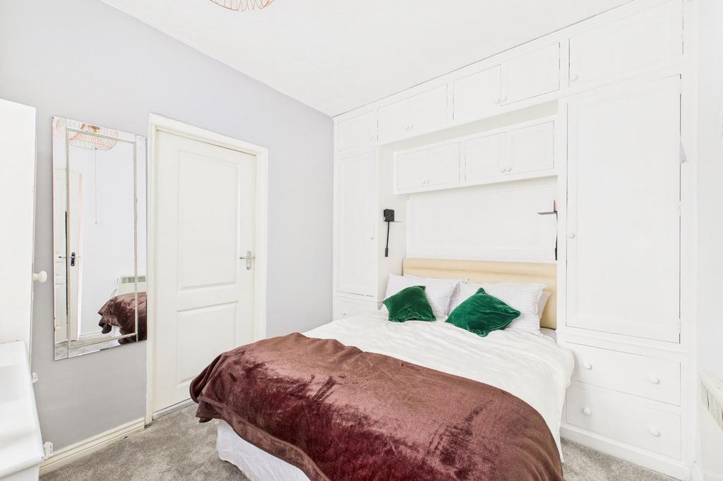 Self-contained flat bedroom