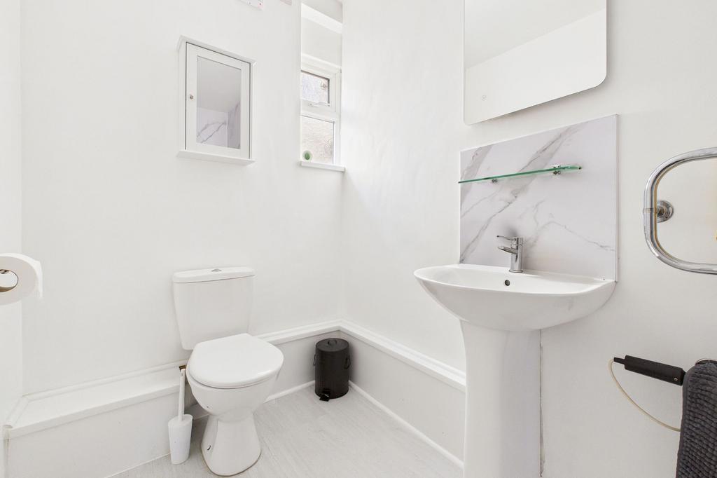 Self-contained flat shower room