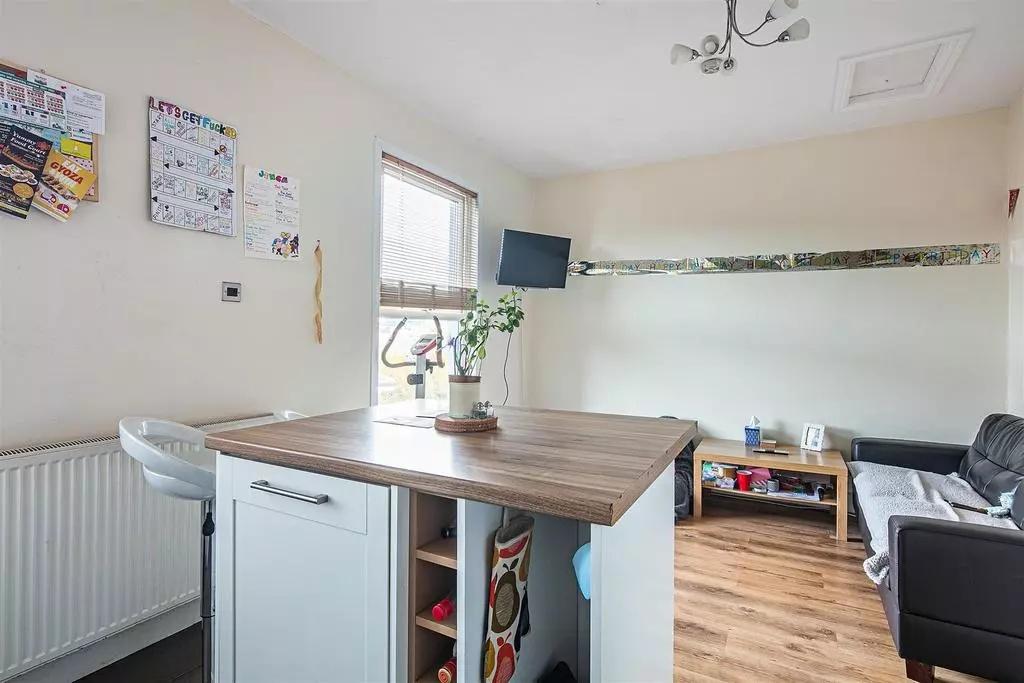 Bright and welcoming living room featuring a mo...