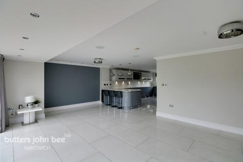 undefined, Den Lane, Crewe