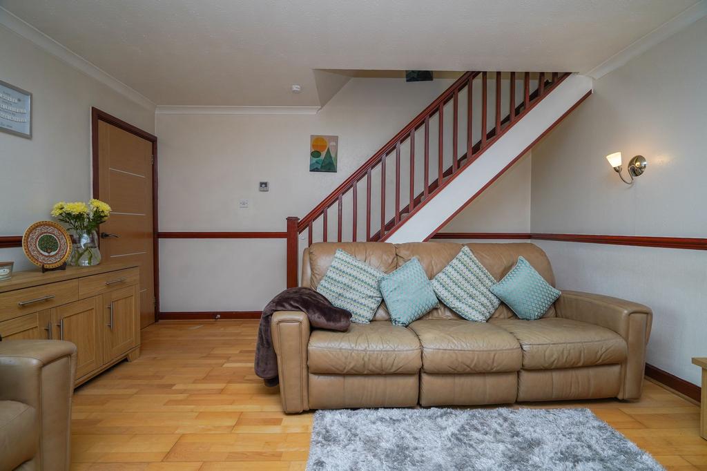 Spacious Living Room with Door Leading to Entry...