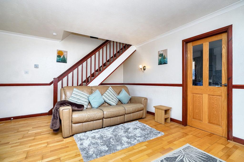 Living Room with Door Leading to Kitchen