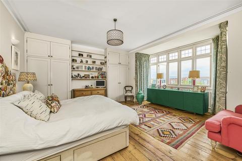 94 Dora Road, London, SW19 7HJ