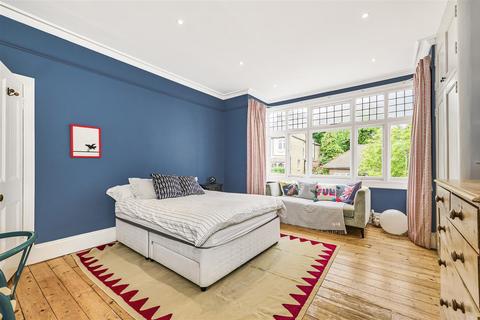 94 Dora Road, London, SW19 7HJ