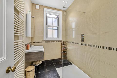 94 Dora Road, London, SW19 7HJ