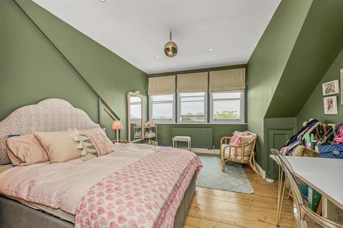 94 Dora Road, London, SW19 7HJ
