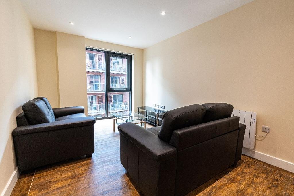 Bright and modern living room featuring comfort...