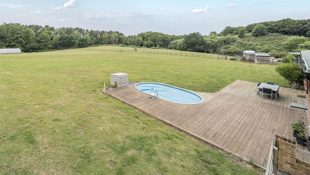 Swimming pool &amp; decking to rear