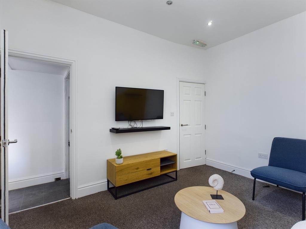 A bright and inviting living room, perfect for ...