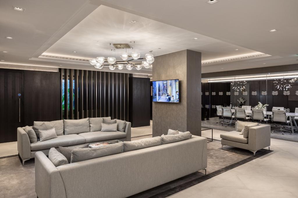A modern and stylish communal lounge featuring ...