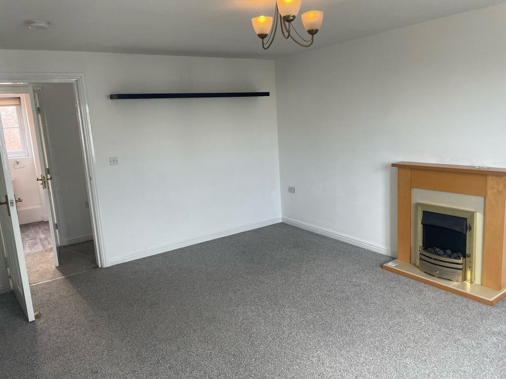 A clean and well-maintained living room featuri...