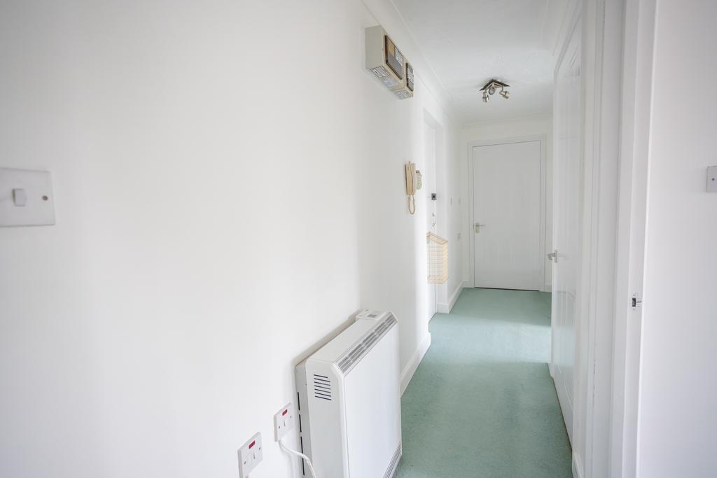 Private Entrance Hall with large storage cupboard