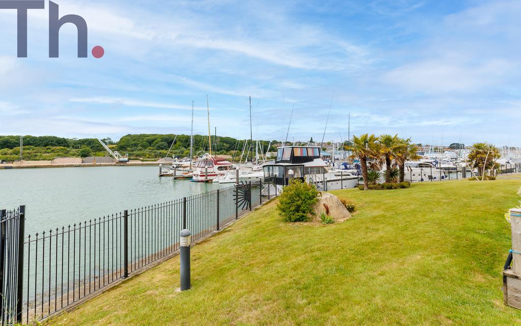 Communal Grounds onto the Riverside