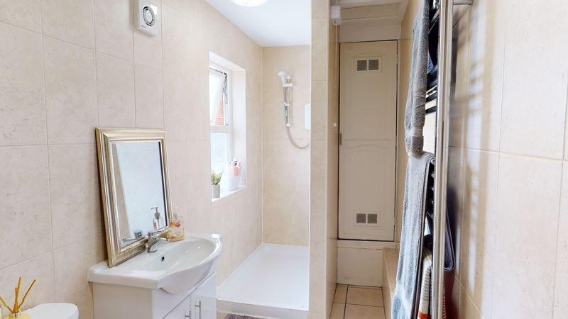 A bright and modern bathroom featuring a clean ...