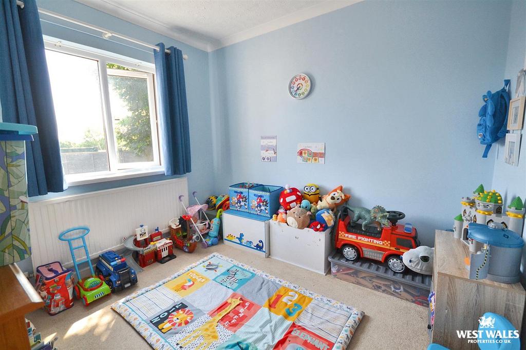 Bedroom three / Kids Playroom