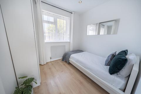 14 Evesham Road, Morden, SM4 6PP