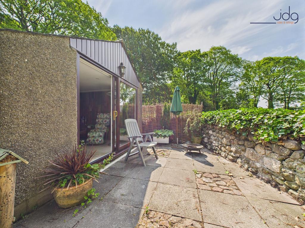 Converted Garage with sliding doors and seating...
