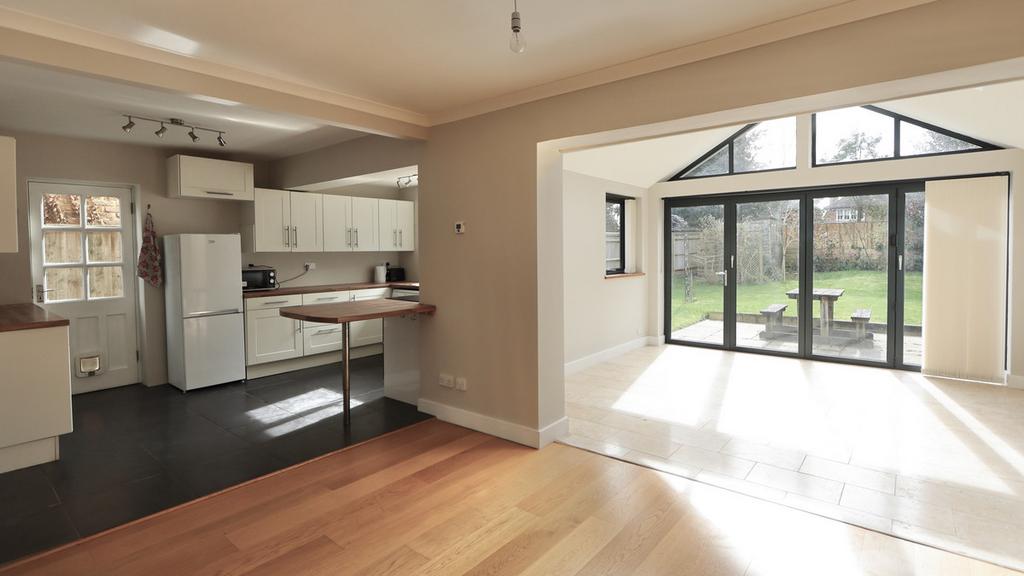 Open plan sitting/dining/kitchen/garden area