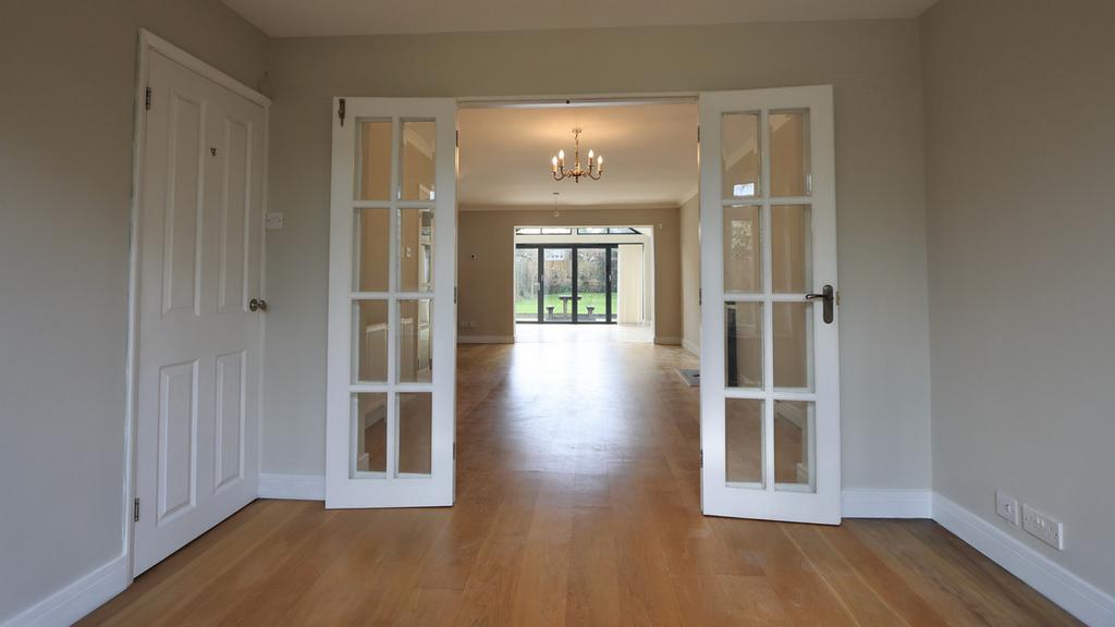 Open plan sitting/dining/kitchen/garden area