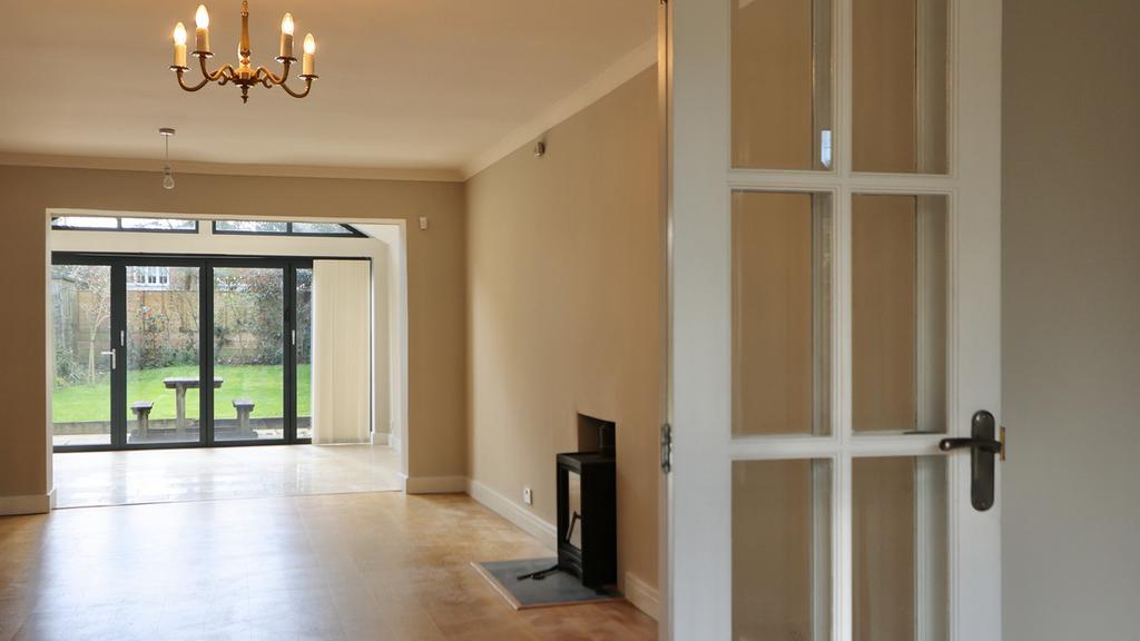 Open plan sitting/dining/kitchen/garden area