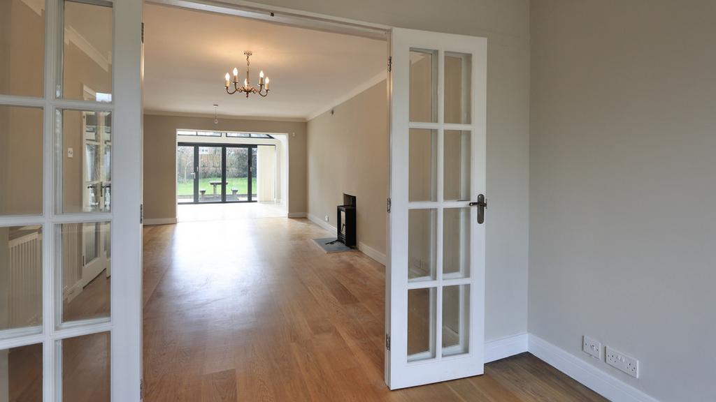 Open plan sitting/dining/kitchen/garden area