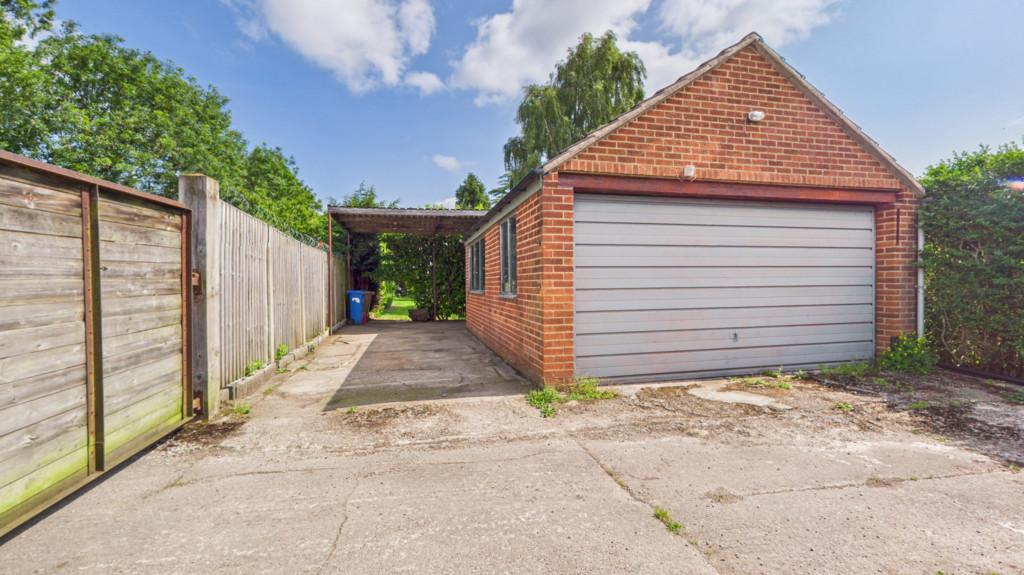 Rear driveway and garage