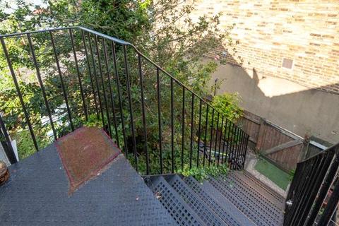 4 Abbey Road, London, SW19 2LZ