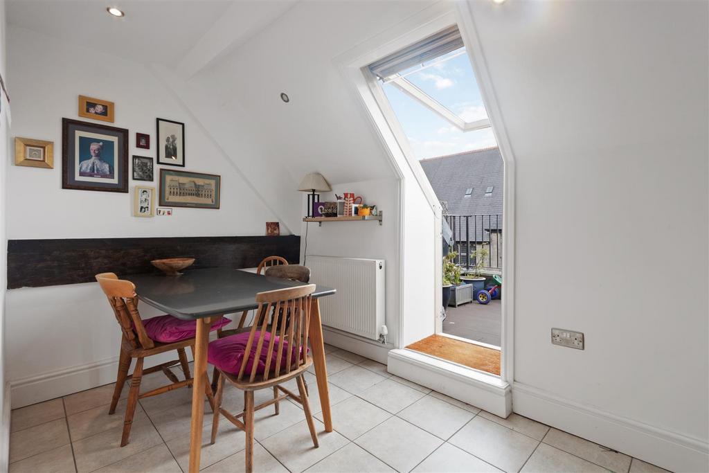 Dining area leading onto balcony