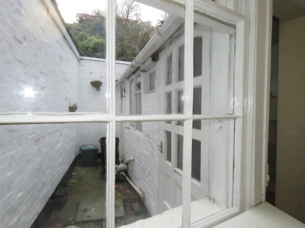 A view through a multi-pane window showcasing a...