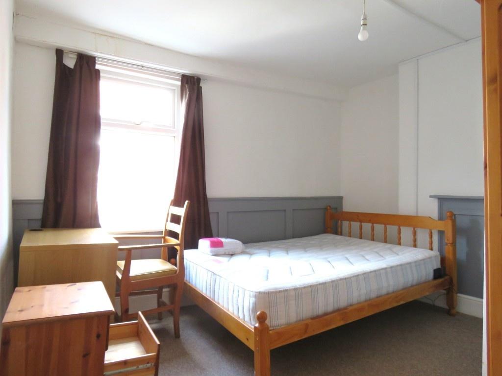 Bright and inviting double bedroom featuring a ...