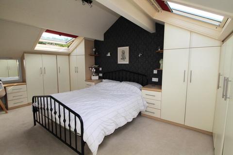 2 Brook Row, Oakworth, Keighley, BD22 0EA